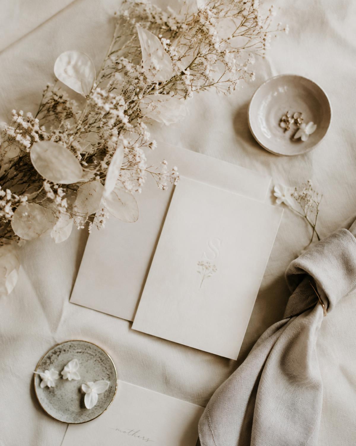 Wedding style details: dried florals, stationery and linen
